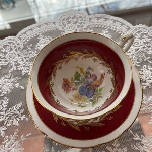 PARAGON Red and Gold Porcelain Tea Cup & Saucer with Floral Center